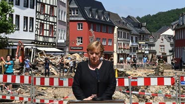 German Chancellor Angela Merkel gives a statement to news media during a visit in flood-stricken Bad Muenstereifel, Germany July 20, 2021. Christof Stache/Pool via REUTERS
