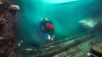 Archaeologists in Egypt unveil military vessel, Greek funerary site in sunken city