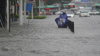 China evacuates residents from flooded neighborhoods