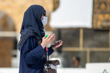 A female pilgrim gestures as she performs Tawaf around Kaaba at the Grand Mosque during the annual Haj pilgrimage, in the holy city of Mecca, Saudi Arabia, July 17, 2021. (Reuters)