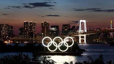 The Olympic Rings are seen in front of the skyline during sunset one night ahead of the official opening of the Tokyo 2020 Olympic Games in Tokyo, Japan, on July 22, 2021. (Reuters)