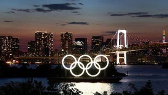 New COVID-19 cases near 2,000 in Tokyo a day before Olympics open