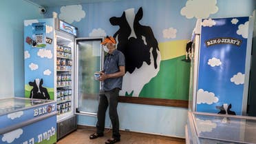 An Israeli shops at the Ben & Jerry's ice-cream factory in the Be'er Tuvia Industrial area, southern Israel. (AP)