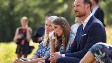 Norway’s Crown Princess Mette-Marit, Princess Ingrid Alexandra and Crown Prince Haakon attend a memorial service as Norway marks 10 years since the Oslo and Utoeya island attacks, on Utoeya island, Norway, on July 22, 2021. (Reuters)
