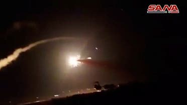 A still image from a video footage shows what appeared to be missile hitting target in air after surface to air missiles were launched into air by Syrian military in Homs, Syria. (File photo: Reuters)
