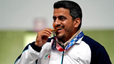 Javad Foroughi celebrates winning the gold medal in the 10m Air Pistol Men's Final during the Tokyo 2020 Olympic Summer Games at Asaka Shooting Range in Tokyo, Japan. (USA TODAY/Reuters)