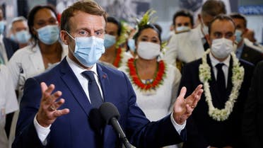France’s President Emmanuel Macron speaks to doctors and nurses working at the French Polynesia Hospital Centre in Papeete following his arrival for a visit to Tahiti in French Polynesia on July 24, 2021.  (Ludovic MARIN/AFP)