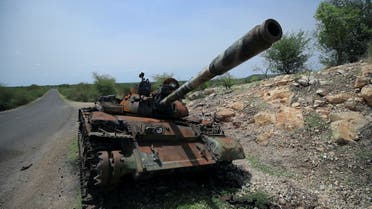 A tank damaged during the fighting between Ethiopia?s National Defense Force (ENDF) and Tigray Special Force stands on the outskirts of Humera town in Ethiopia July 1, 2021 Picture taken July 1, 2021. REUTERS/Stringer