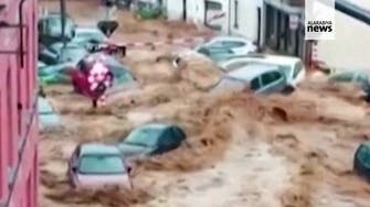 Torrent of floodwater in Belgium washes away cars