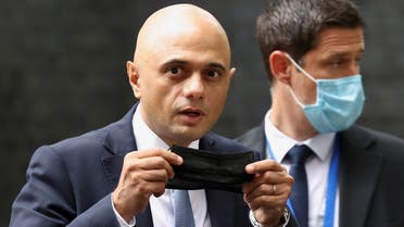 Britain's new Health Secretary Sajid Javid holds a face mask, as he leaves the Downing Street in London, Britain, June 30, 2021. (File Photo: Reuters)