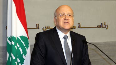 A handout picture released by Dalati and Nohra on March 22, 2013 shows Lebanese Prime Minister Najib Mikati announcing the resignation of the Lebanese government during a press conference in Beirut. AFP PHOTO / DALATI AND NOHRA -------- RESTRICTED TO EDITORIAL USE - MANDATORY CREDIT AFP PHOTO / HO / DALATI AND NOHRA - NO MARKETING - NO ADVERTISING CAMPAIGNS - DISTRIBUTED AS A SERVICE TO CLIENTS