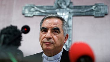 Cardinal Giovanni Angelo Becciu, who has been caught up in a real estate scandal, pauses as he speaks to the media a day after he resigned suddenly and gave up his right to take part in an eventual conclave to elect a pope, near the Vatican, in Rome, Italy, September 25, 2020. (Reuters)