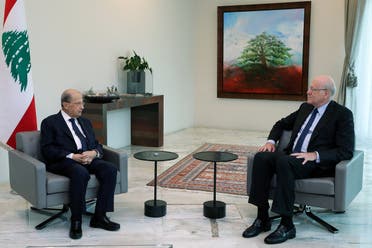 Lebanon’s President Michel Aoun (L) meeting with two-time premier Najib Mikati at the presidential palace in Baabda, east of the capital Beirut on July 26, 2021. (stringer/Dalati and Nohra/AFP)