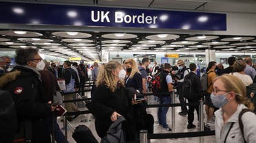 Arriving passengers queue at UK Border Control at the Terminal 5 at Heathrow Airport in London, Britain June 29, 2021. (Reuters)