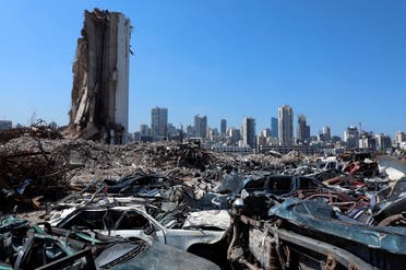 The wreckage of vehicles are pictured near Beirut's destroyed grain silo at the site of the August 4, 2020 explosion at Beirut port, July 13, 2021. (Reuters)