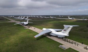 Service members of the Russian airborne forces board Ilyushin Il-76 transport planes during drills at a military aerodrome in the Azov Sea port of Taganrog, Russia April 22, 2021. Picture taken with a drone. (File photo: Reuters)