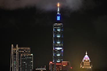 A general view shows Taipei 101, a 508-meter high’s commercial building, displays “ a turn off the light, go to sleep earlier today“ in Chinese to mark Earth Hour Day on it’s building on March 28, 2020. (AFP)