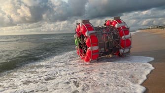 Iranian in giant hamster wheel washes up on Florida coast