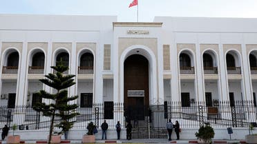 People stand outside a closed court during a nationwide strike in Tunis, Tunisia November 22, 2018. (Reuters)