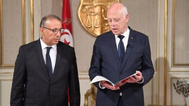الرئيس التونسي ووزير الداخلية المكلف