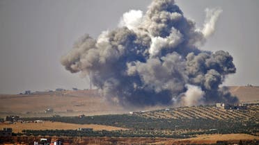 Smoke rises above rebel-held areas of the city of Daraa, during reported airstrikes by Syrian regime forces. (File Photo: AFP)