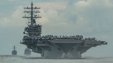 The USS Ronald Reagan in formation in the Philippine Sea, July 19, 2020. (Reuters)