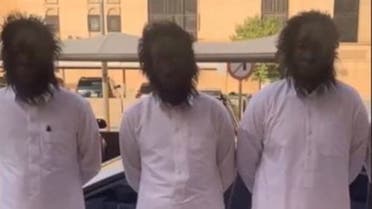 Three of the four men who were arrested for wearing scary masks and chasing people in Riyadh. (Twitter)