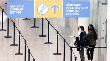 Passengers arrive at Toronto’s Pearson airport after mandatory coronavirus disease (COVID-19) testing took effect for international arrivals in Mississauga, Ontario, Canada February 1, 2021. (Reuters)