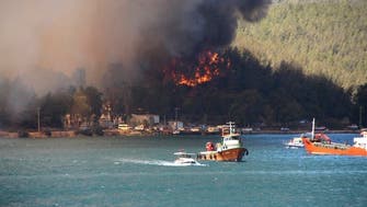 Turkey evacuates tourists by boat from wildfires raging in Aegean resort of Bodrum