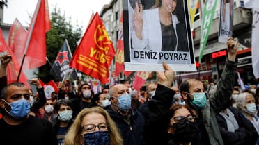 Demonstrators carry a picture of Deniz Poyraz, who was killed in an attack on a local office of the pro-Kurdish Peoples' Democratic Party (HDP), during a protest in Istanbul, Turkey, on June 18, 2021. (Reuters)