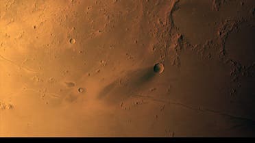 An image obtained by the UAE's Hope Probe Mission to Mars showing the planet's surface viewing Elysium Planitia volcanic region, from an altitude of approximately 1,325km. Picture taken on 15 March 2021, released on August 2, 2021. (Twitter)