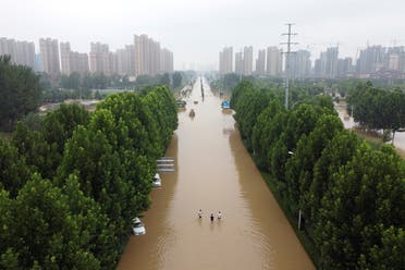 An aerial view shows a flooded road following heavy rainfall in Zhengzhou, Henan province, China July 23, 2021. (Reuters)