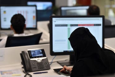 Employees work at the Saudi National Health Emergency Operations Center (NHEOC) in the capital Ryadh on May 3, 2020, during the novel coronavirus pandemic crisis. (AFP)