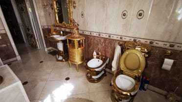 One photo — that of the residence's golden toilet bowl — quickly spread across Russian social media. (Twitter)