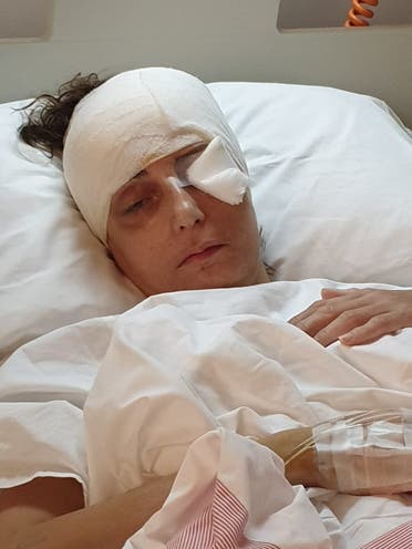 Rita Freiha Khoury, recovering in a hospital bed right after being heavily injured during the blast. (Supplied)