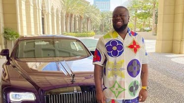 Instagram celebrity ‘Ray Hushpuppi’ loves to flaunt his wealth on Instagram with pictures of himself alongside luxury cars and jets. (Supplied)