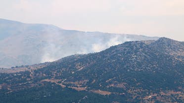 Smoke rises as seen from Ibl al-Saqi village in southern Lebanon, August 6, 2021. (Reuters)