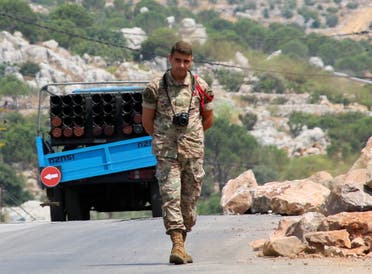 A Lebanese army member walks near a pickup truck with a rocket launcher in Chouaya, Lebanon, August 6, 2021. (File photo: Reuters)
