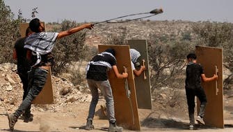 Israeli troops shoot, arrest suspected Palestinian attacker