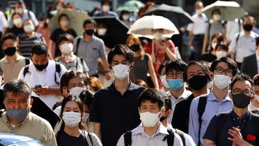 People wearing protective masks, amid the coronavirus disease (COVID-19) outbreak, make their way in Tokyo, Japan, August 6, 2021. (File Photo: Reuters)