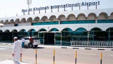 A man walks past the Ras al-Khaimah International Airport in Ras al-Khaimah, United Arab Emirates, Wednesday, Oct. 23, 2019. (AP)