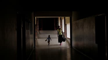 A mother and child arrive for treatment at a local government hospital in Harare, Zimbabwe, February 4, 2020. (File photo: Reuters)