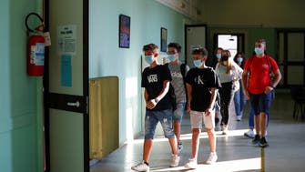 US officials divided over mask rules for schools as child COVID hospitalizations rise
