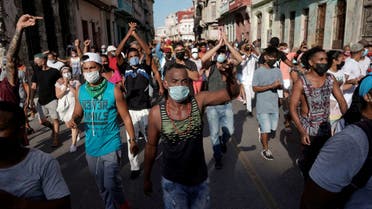 People shout slogans against the government during a protest against and in support of the government, amidst the coronavirus disease (COVID-19) outbreak, in Havana, Cuba July 11, 2021. (Reuters)