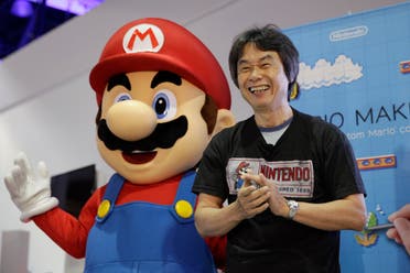 In this June 11, 2014 file photo, Japanese video game designer Shigeru Miyamoto introduces the Nintendo's Mario Maker during a press event at the Nintendo booth at the Electronic Entertainment Expo, in Los Angeles. After rebounding with last year's Mario Kart 8 and Super Smash Bros. (File photo: AP)