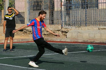 Islam Mohammed Ibrahim Battah, an Egyptian with a resemblance to Barcelona's forward Lionel Messi, attends a training in a club at Sharqia Governorate, north of Cairo, Egypt August 8, 2021. (Reuters)