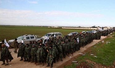 عناصر من الصائل السورية الموالية لتركيا تستعد للذهاي إلى ليبيا (أرشيفية)