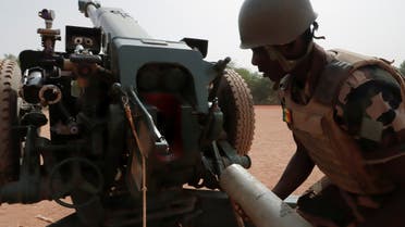 A Malian soldier of the 614th Artillery Battery is pictured during a training session on a D-30 howitzer with the European Union Training Mission (EUTM), to fight militants, in the camp of Sevare, Mopti region, in Mali, on March 23, 2021. (Reuters)
