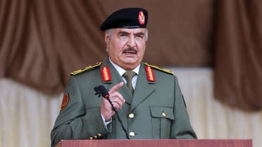Libyan military commander Khalifa Haftar gestures as he speaks during Independence Day celebrations in Benghazi, Libya December 24, 2020. REUTERS/Esam Omran Al-Fetori