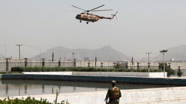 A military helicopter carrying Afghan President Ashraf Ghani prepares to land near the parliament in Kabul, Aug. 2, 2021. (Reuters)